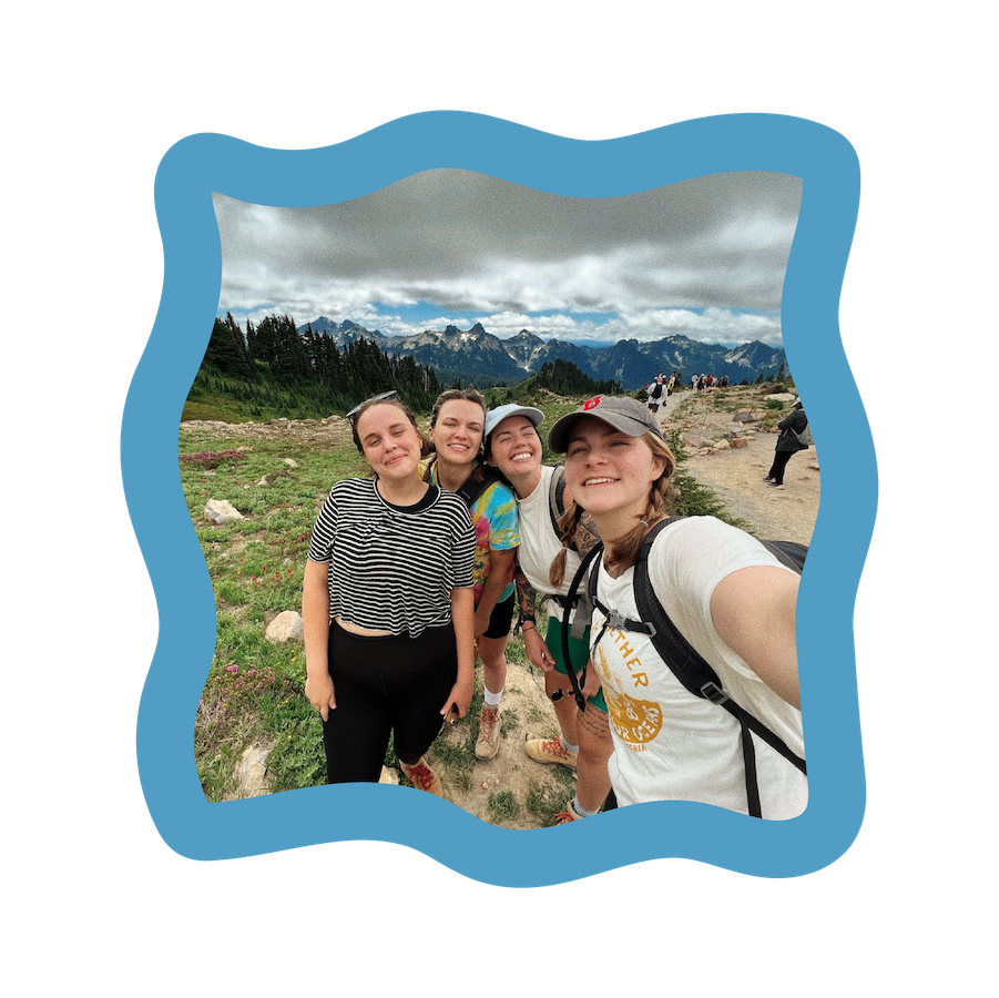 4 friends taking a selfie on a hike