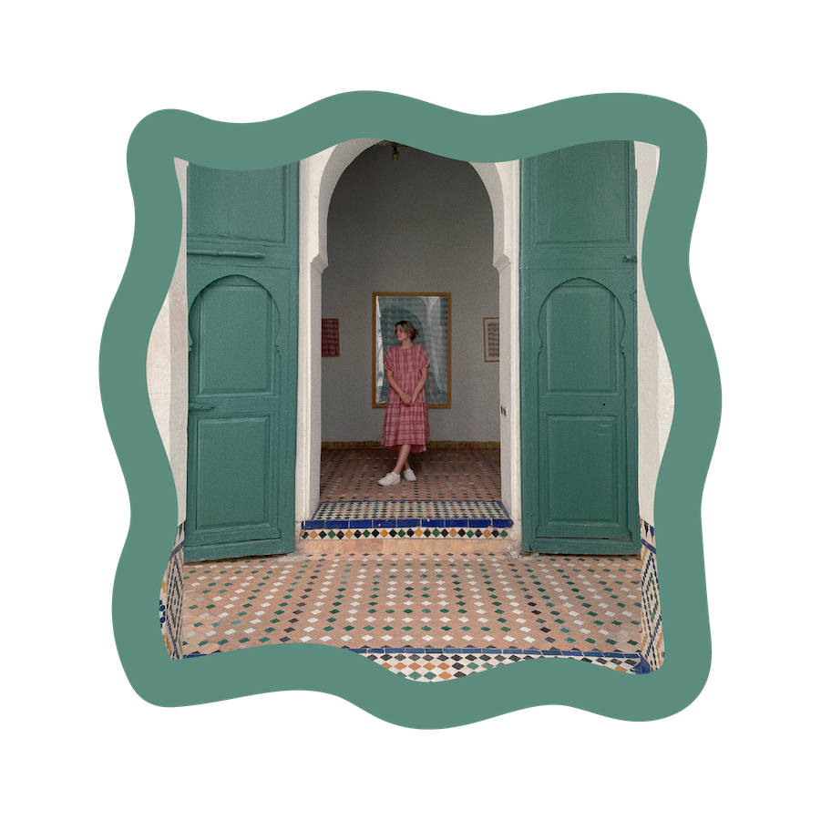 girl standing in archway